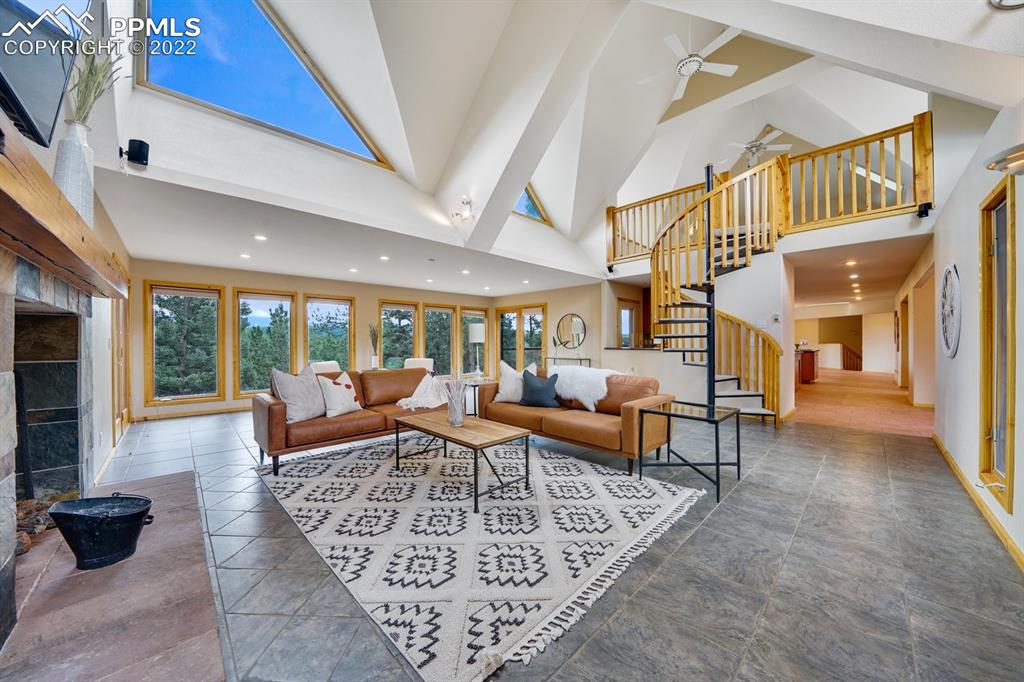 6900 Highway 24 Divide, CO 80814 - Photo 18 of 50 a living room with furniture and a rug