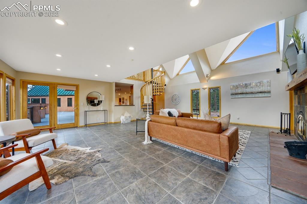6900 Highway 24 Divide, CO 80814 - Photo 21 of 50 a living room with furniture and a large window