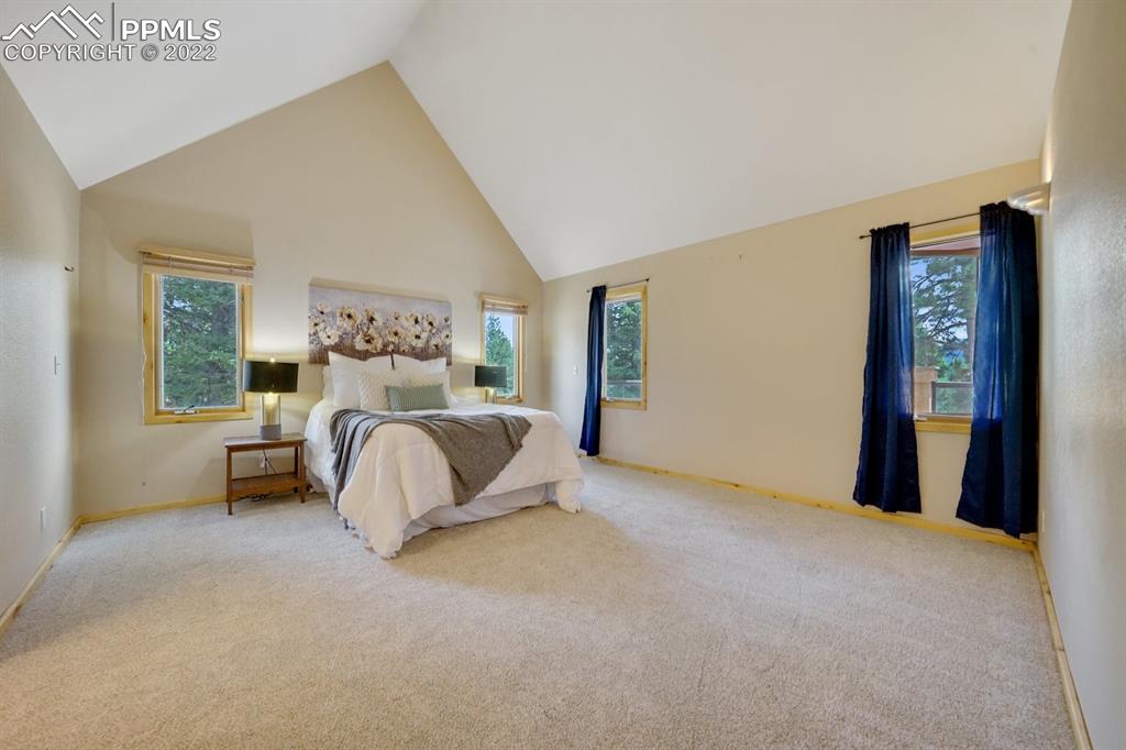 6900 Highway 24 Divide, CO 80814 - Photo 25 of 50 a bedroom with a bed and window