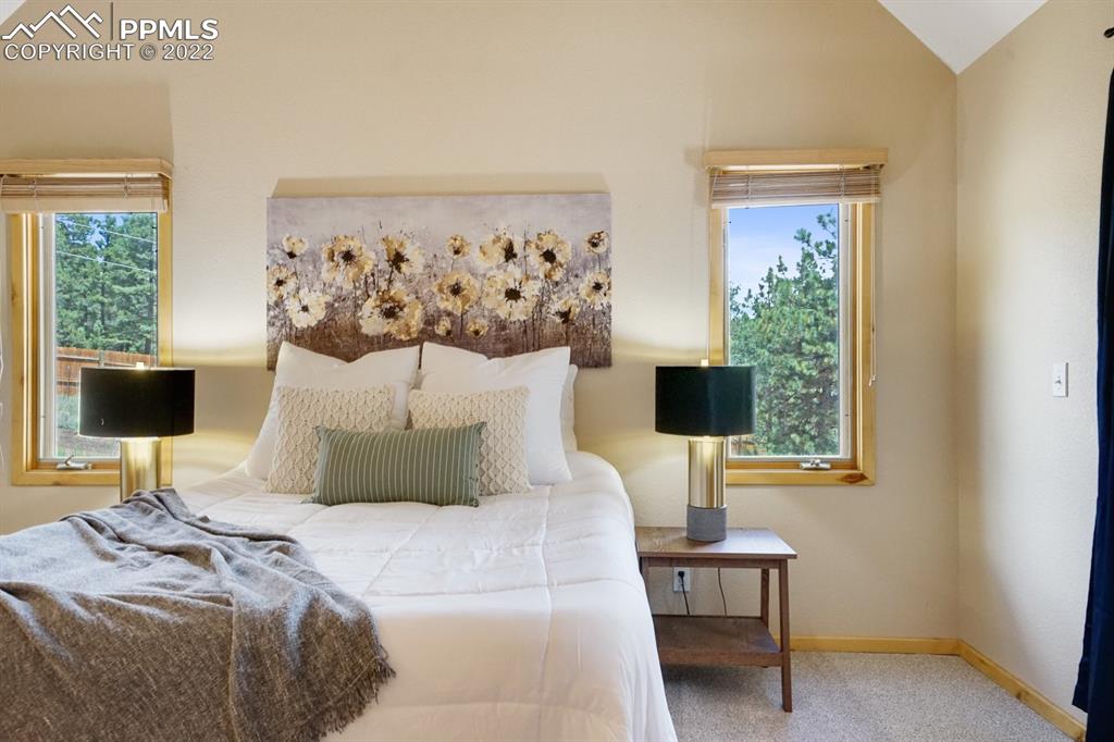 6900 Highway 24 Divide, CO 80814 - Photo 26 of 50 a bedroom with a bed and a table