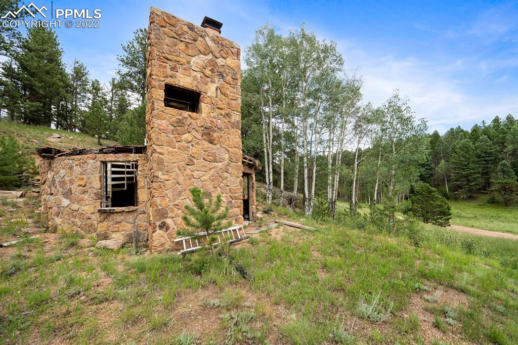 6900 Highway 24 Divide, CO 80814 - Photo 47 of 50 a backyard of a house with lots of green space