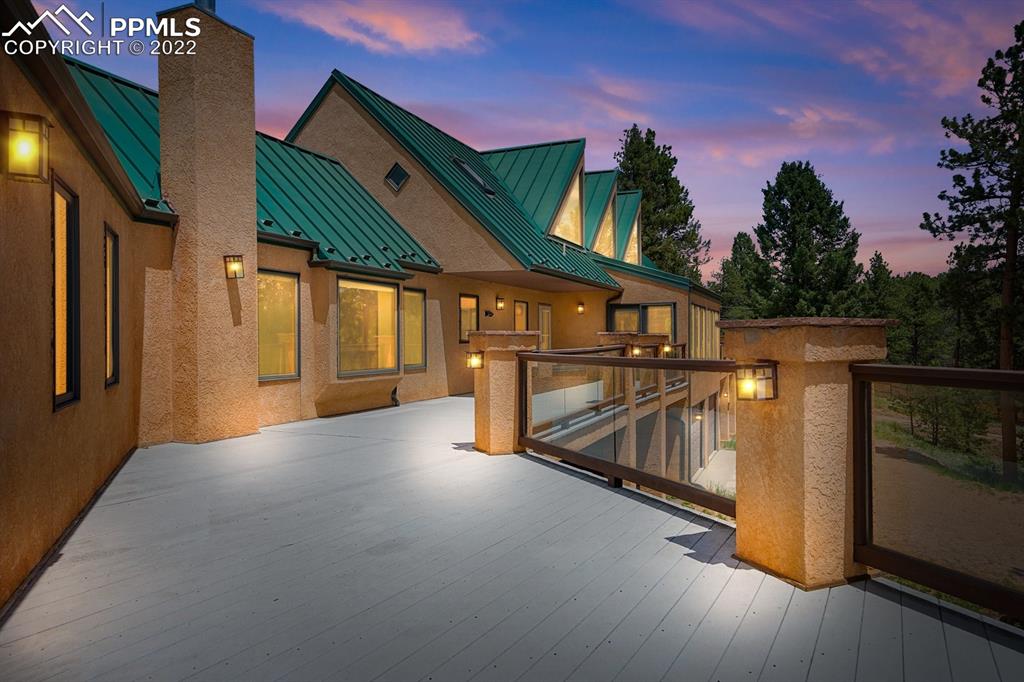 6900 Highway 24 Divide, CO 80814 - Photo 49 of 50 a view of a house with wooden stairs and a small yard