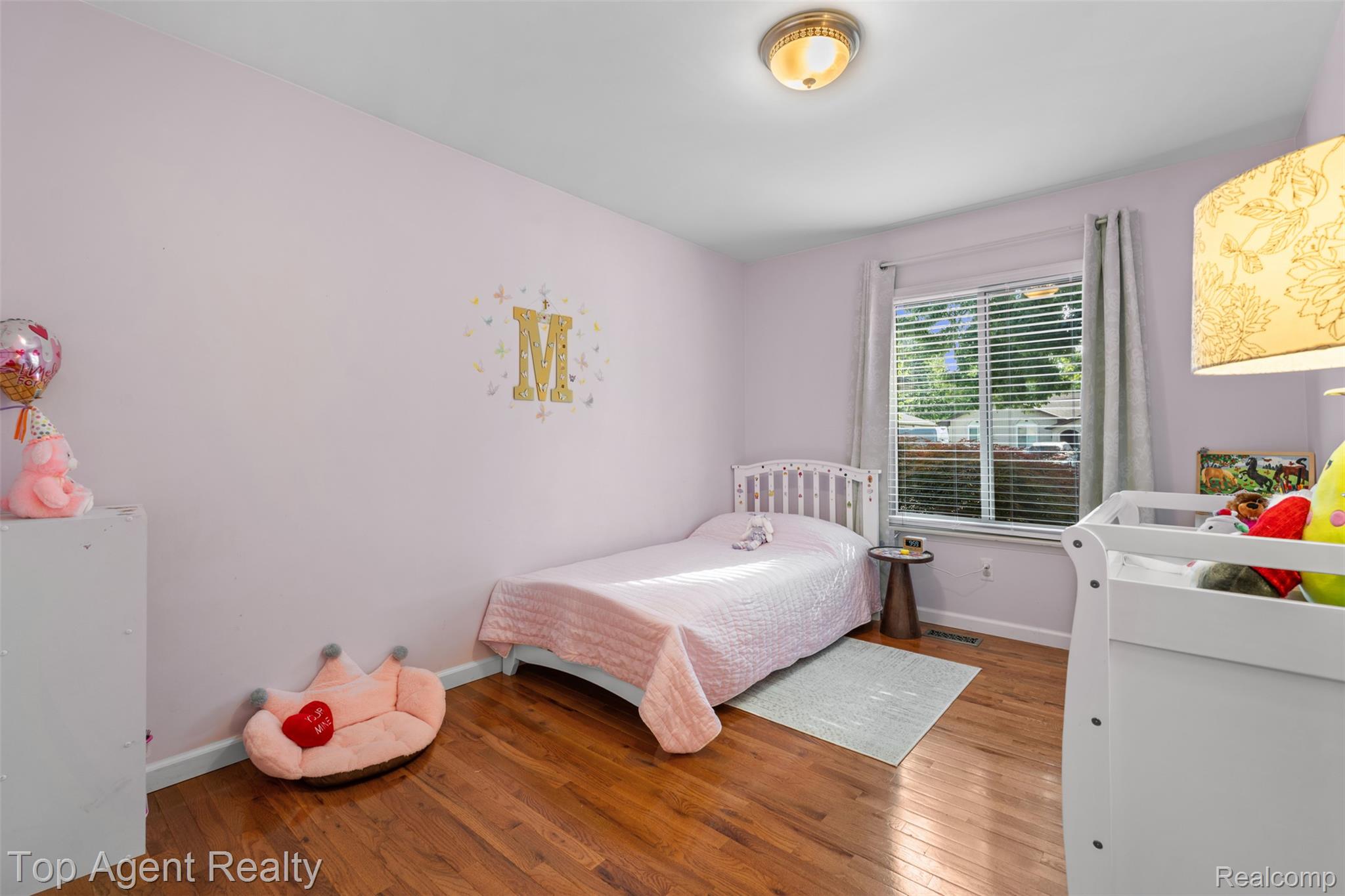 1351 Milverton Road Troy, MI 48083 - Photo 18 of 42 Bedroom with hardwood / wood-style floors and baseboards