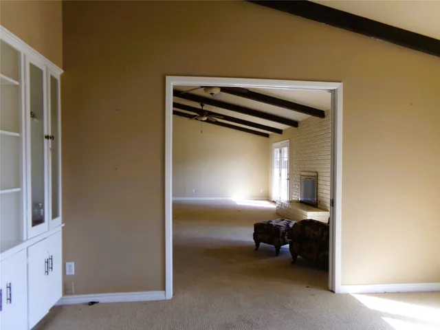 a view of livingroom with furniture and a window