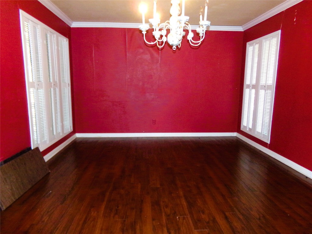 605 South Summit Street Weimar, TX 78962 - Photo 16 of 24 a view of empty room with wooden floor and fan