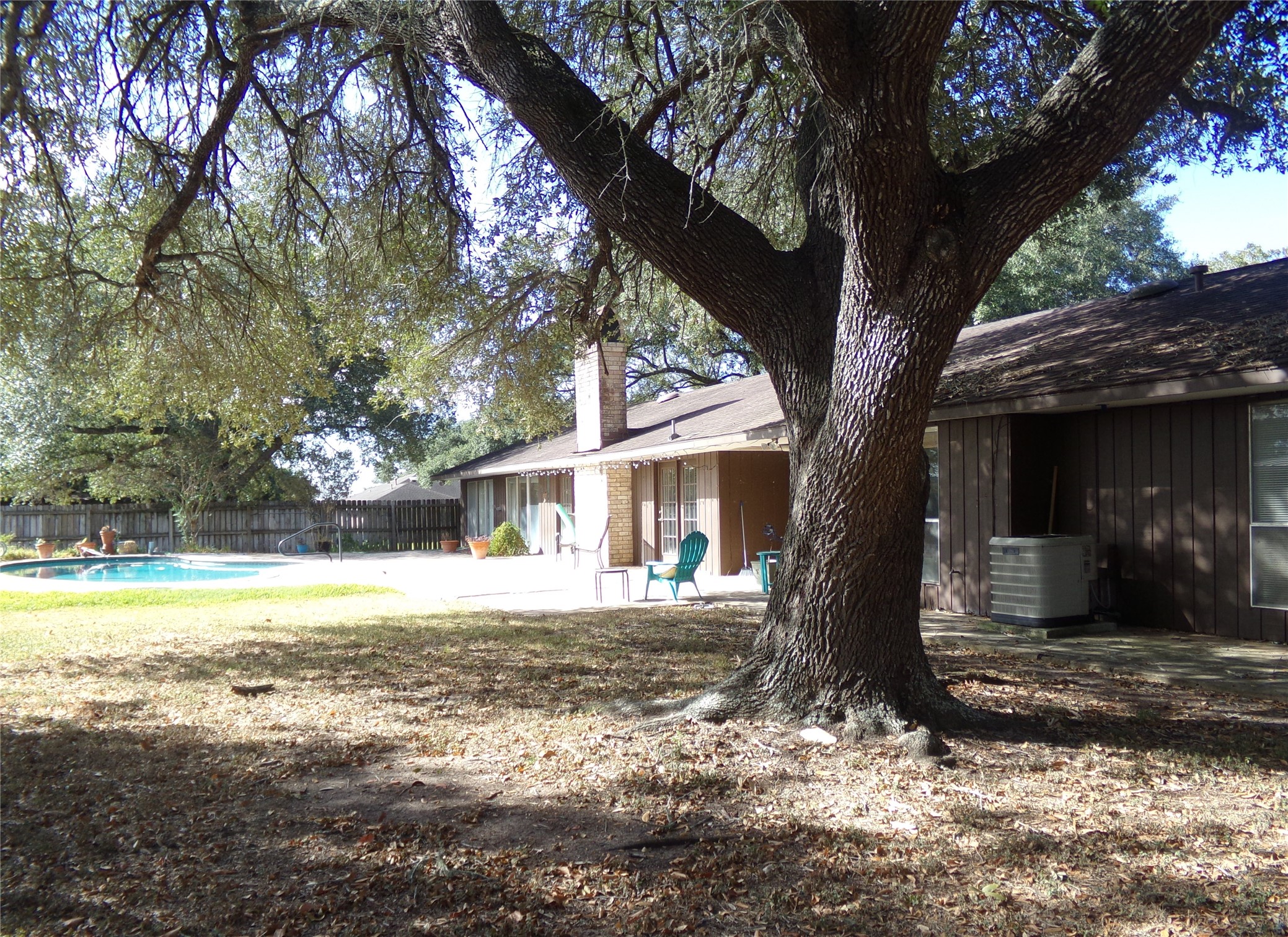 605 South Summit Street Weimar, TX 78962 - Photo 19 of 24 a view of a house with a yard