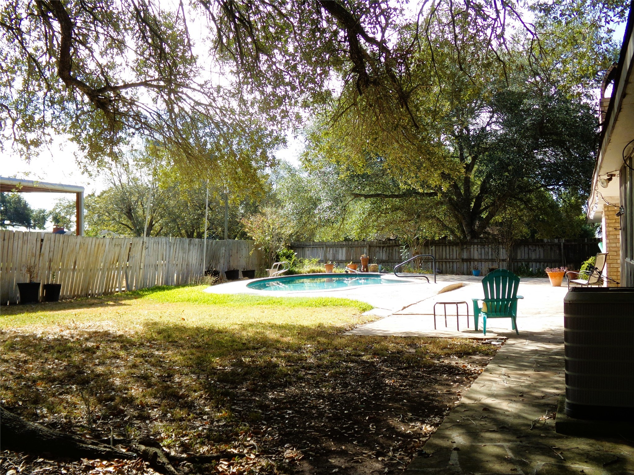 605 South Summit Street Weimar, TX 78962 - Photo 20 of 24 a view of a backyard with swimming pool