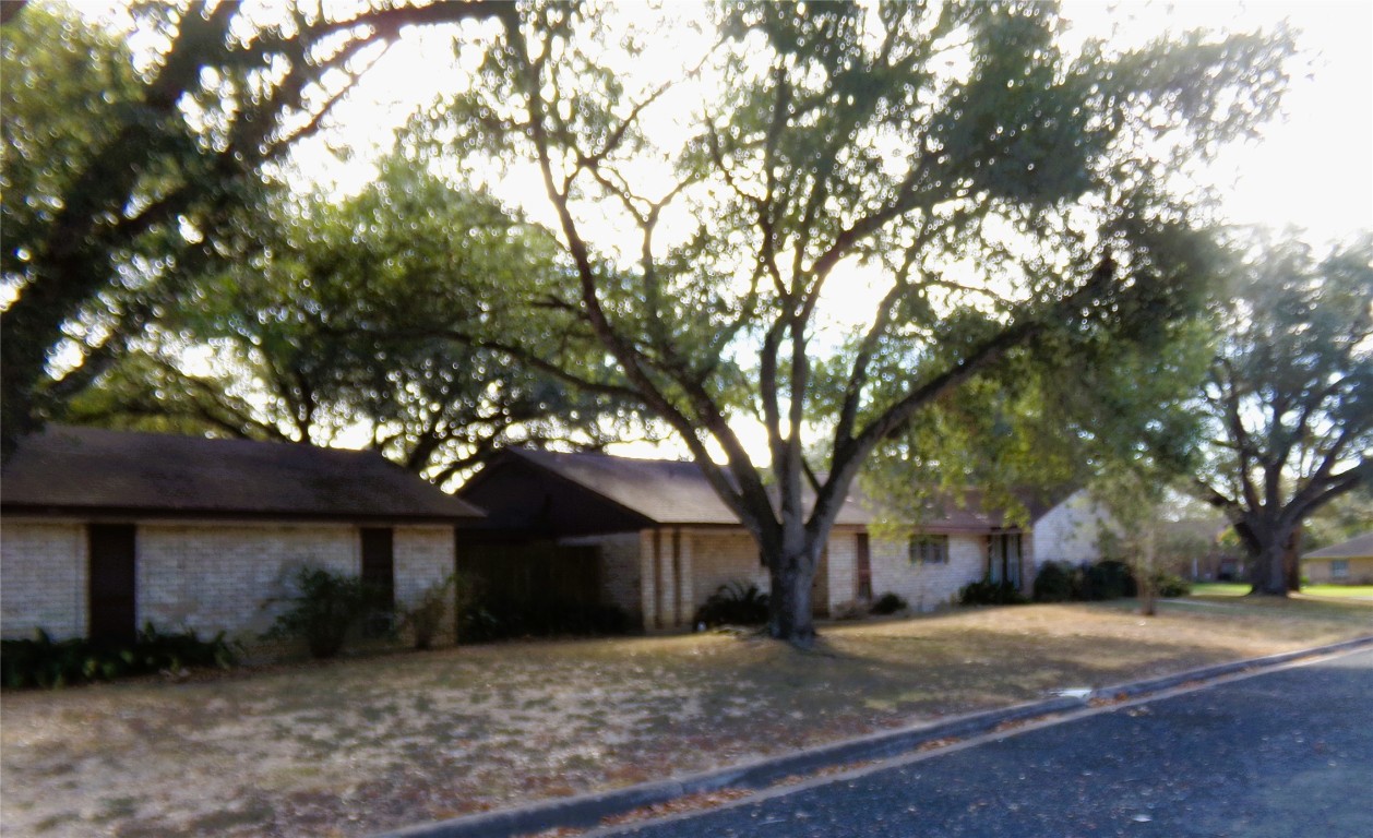 605 South Summit Street Weimar, TX 78962 - Photo 22 of 24 a view of a house with a yard