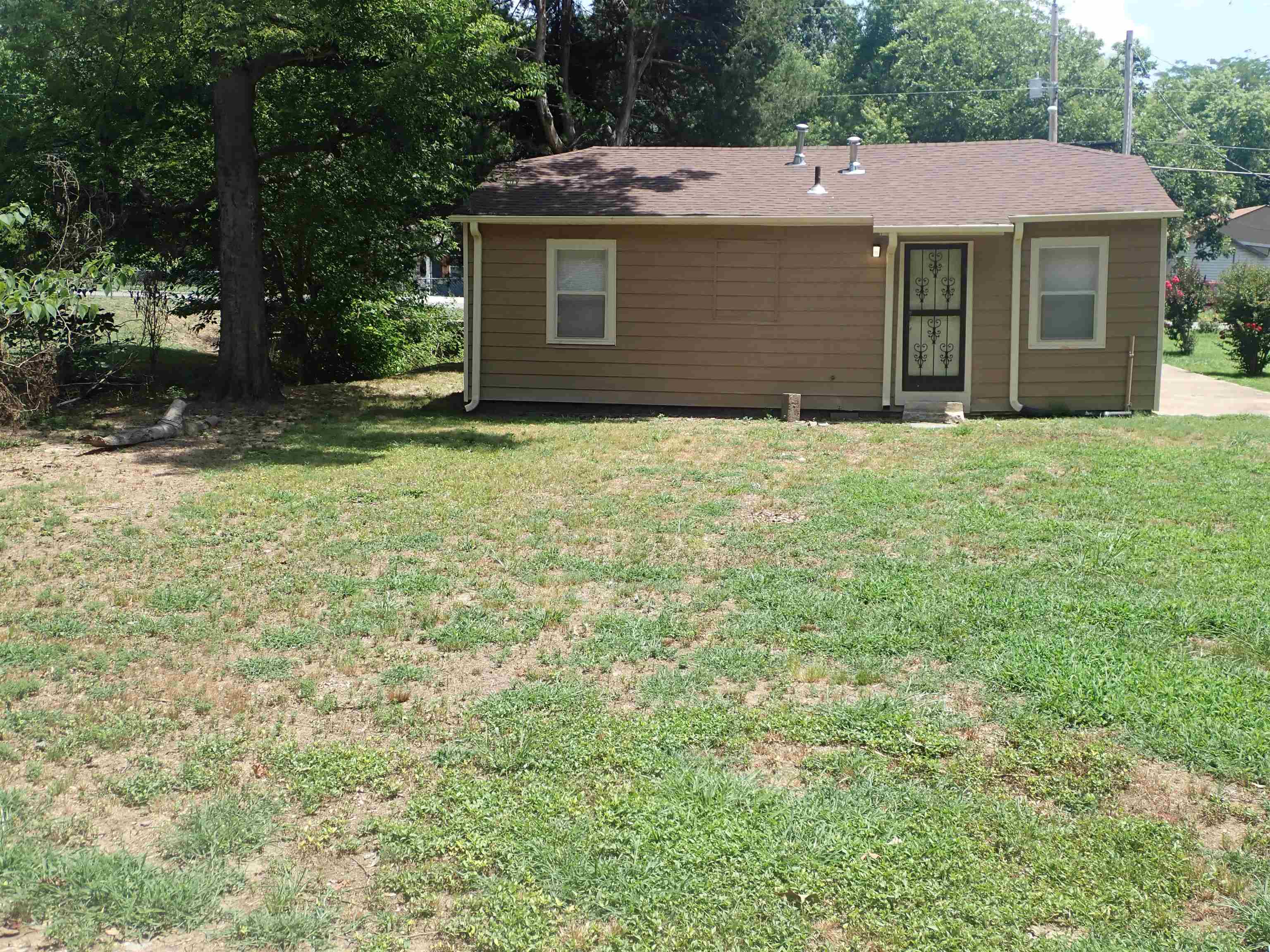 2633 Walnut Road Memphis, TN 38128 - Photo 2 of 6 a view of a house with a yard