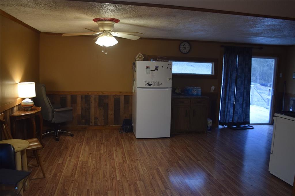 327 Constantine Road Smock, PA 15480 - Photo 10 of 10 a view of a livingroom with furniture and wooden floor