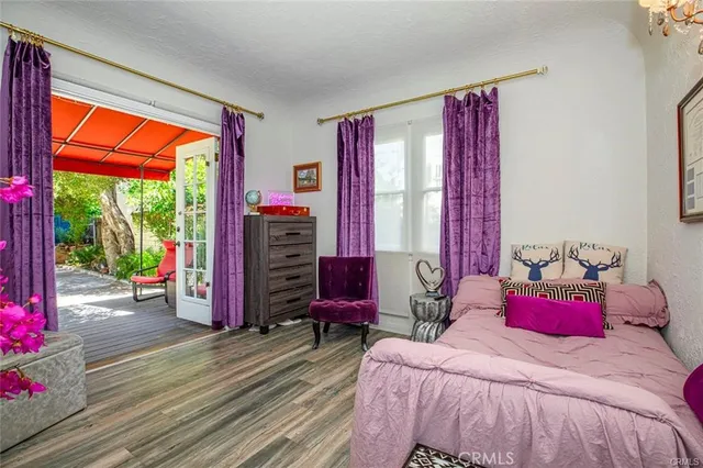 a view of backyard with swimming pool