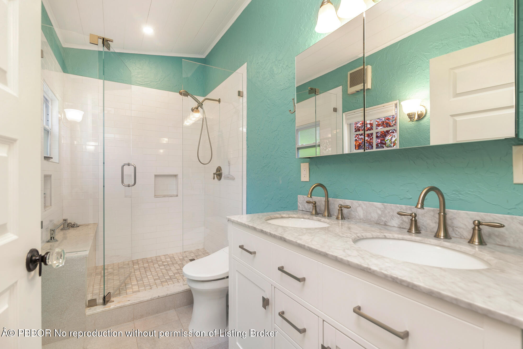 714 Sunset Road West Palm Beach, FL 33401 - Photo 11 of 18 a bathroom with a granite countertop sink toilet and shower