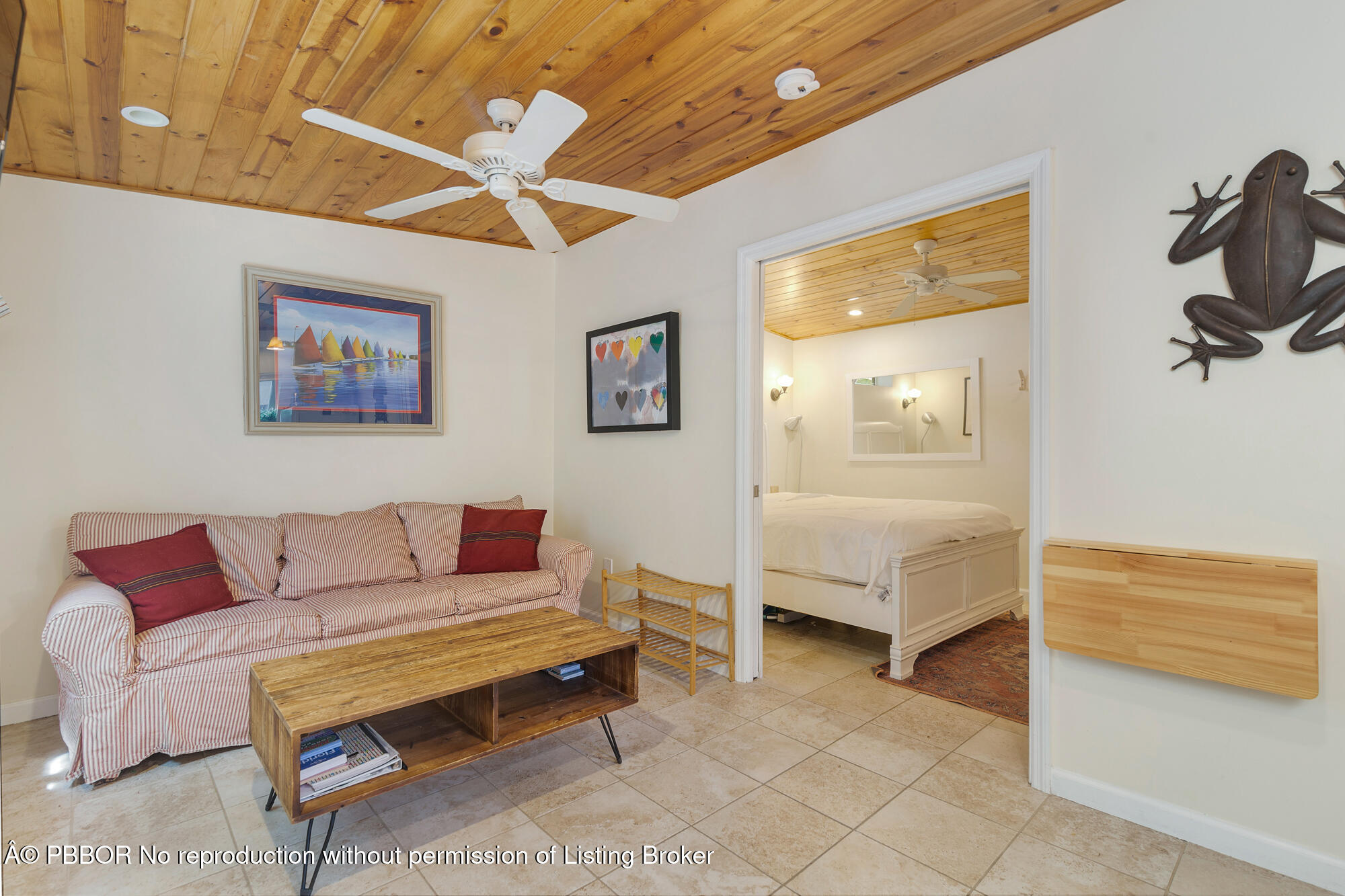 714 Sunset Road West Palm Beach, FL 33401 - Photo 13 of 18 a living room with furniture and a dresser