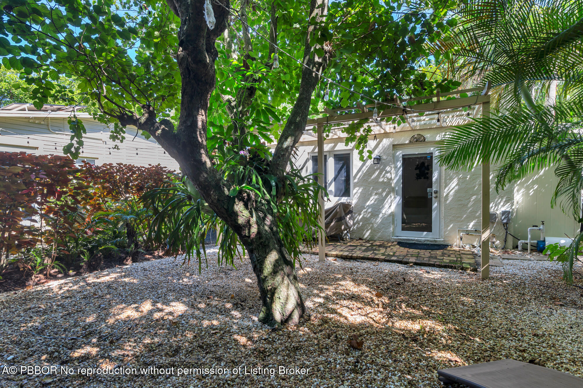 714 Sunset Road West Palm Beach, FL 33401 - Photo 18 of 18 a front view of a house with a yard