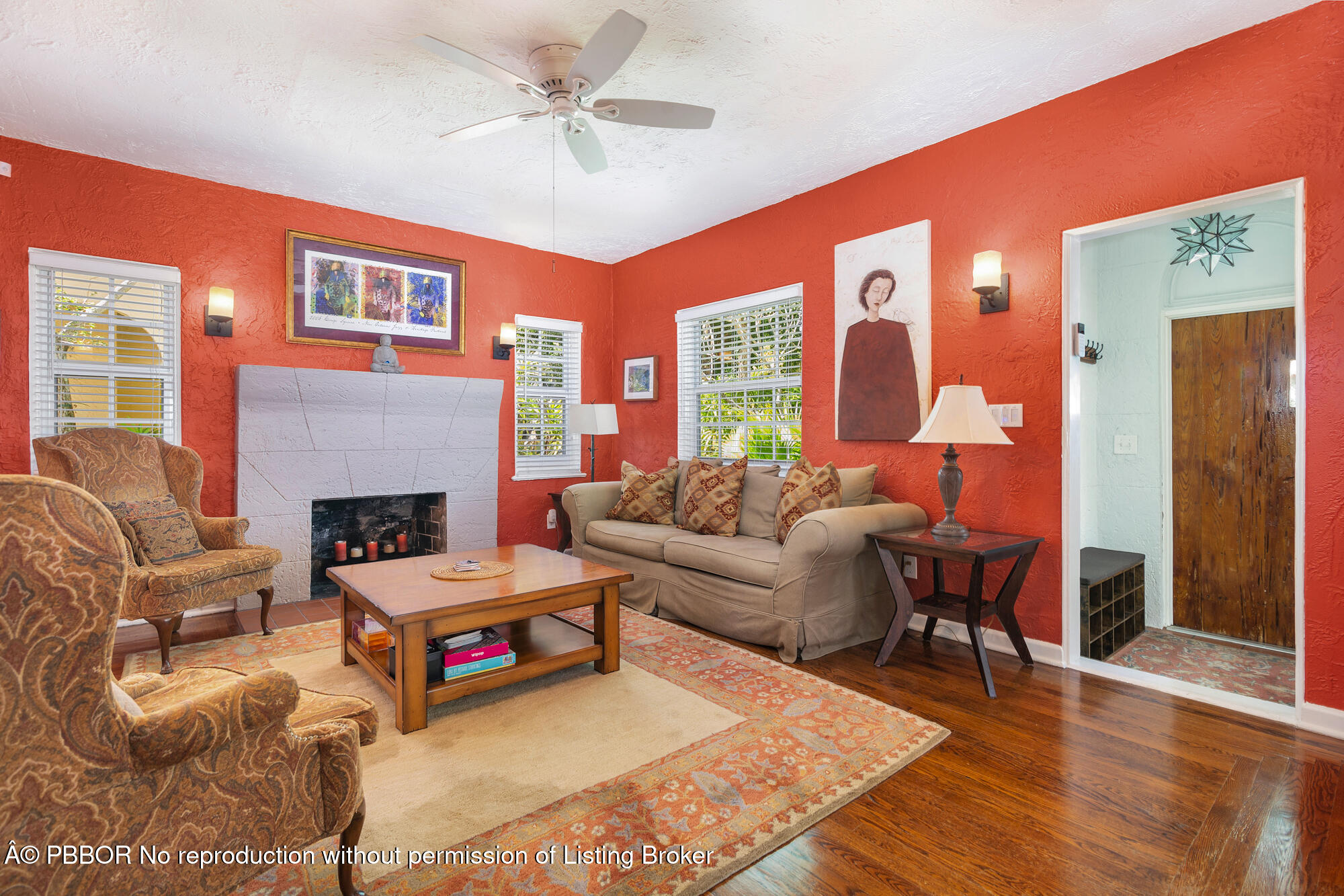 714 Sunset Road West Palm Beach, FL 33401 - Photo 4 of 18 a living room with furniture and a fireplace