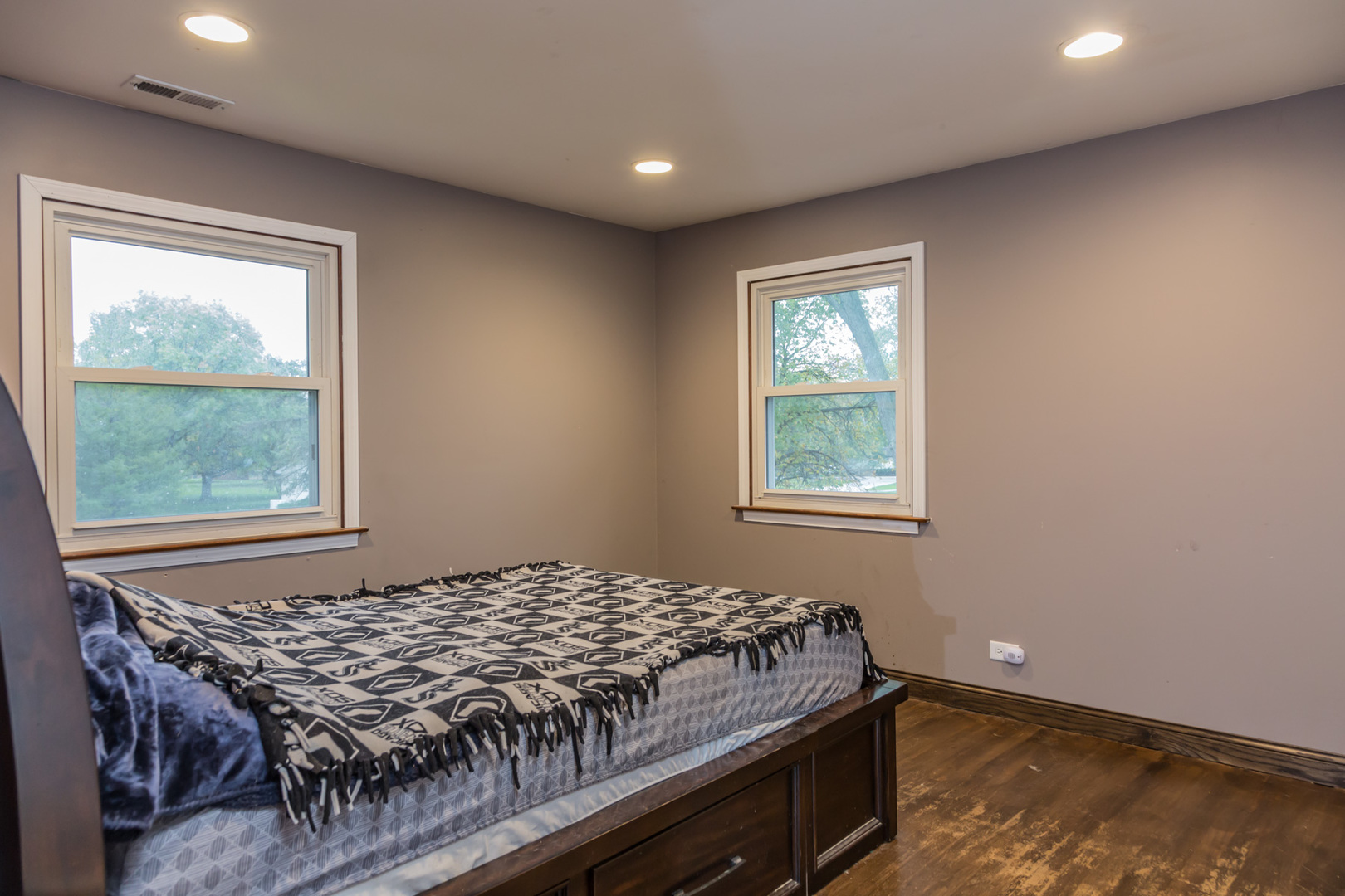 4N726 Klein Road West Chicago, IL 60185 - Photo 20 of 25 a bed sitting in a room next to a window