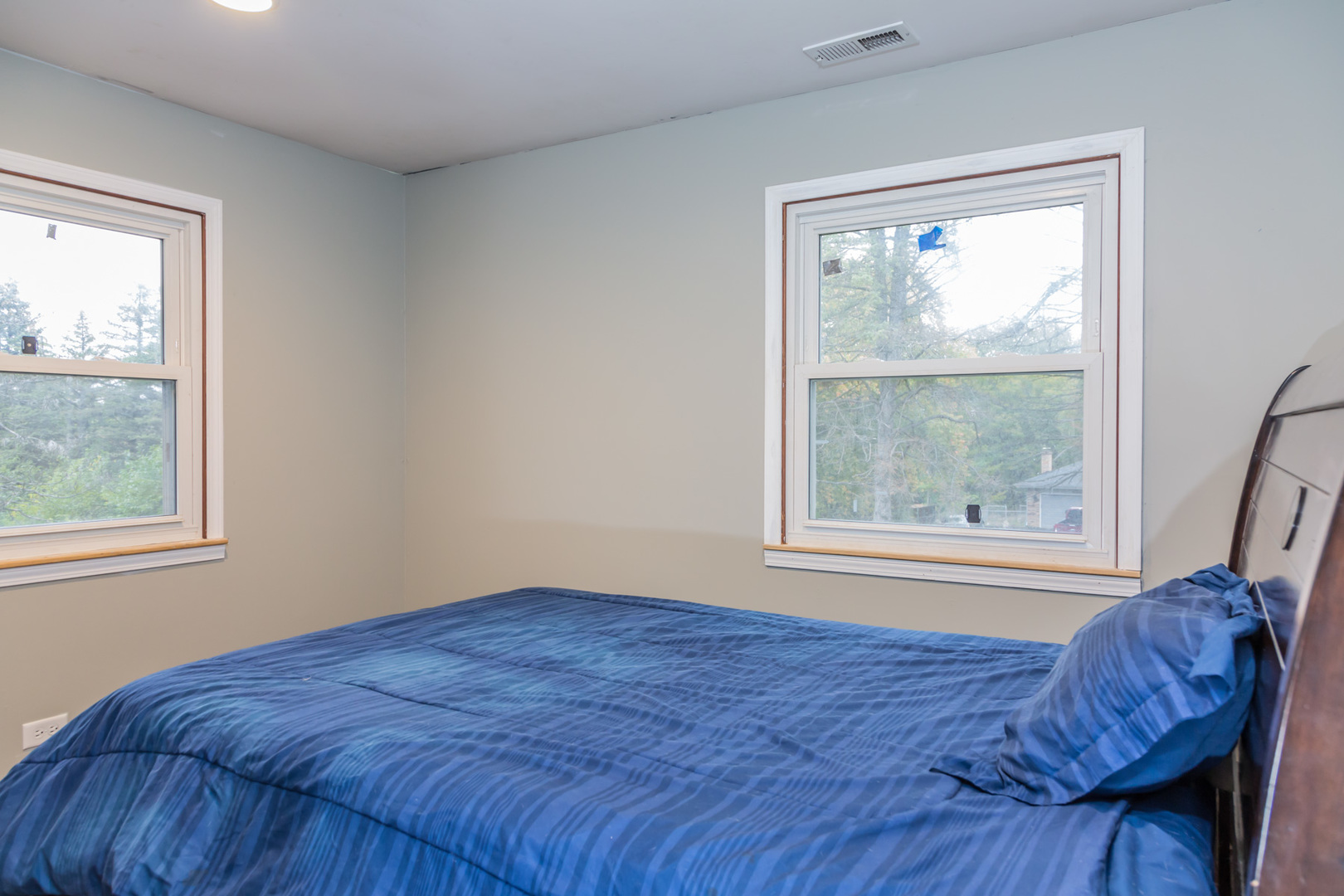 4N726 Klein Road West Chicago, IL 60185 - Photo 21 of 25 a bed sitting in a bedroom next to a window