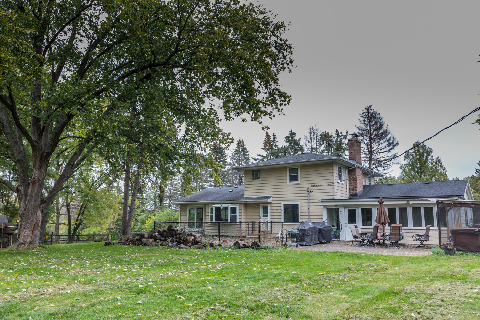4N726 Klein Road West Chicago, IL 60185 - Photo 23 of 25 a view of a house with a yard porch and sitting area