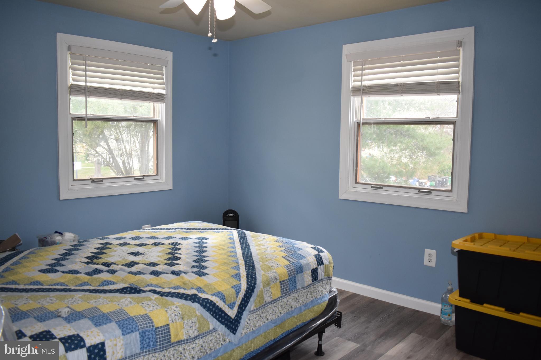 12176 Dove Circle Laurel, MD 20708 - Photo 18 of 34 a bedroom with a bed and a window