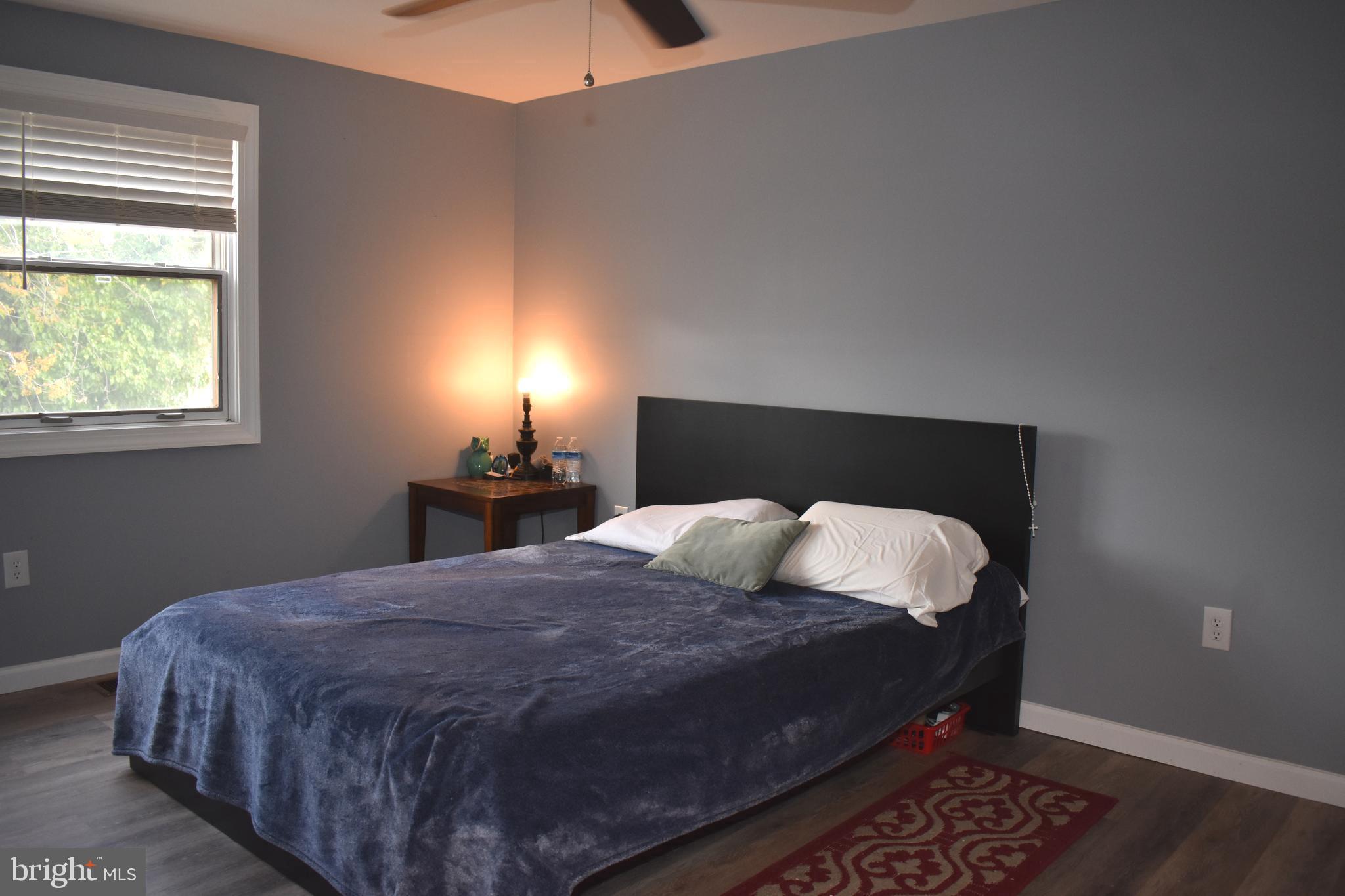 12176 Dove Circle Laurel, MD 20708 - Photo 24 of 34 a bedroom with a bed and window