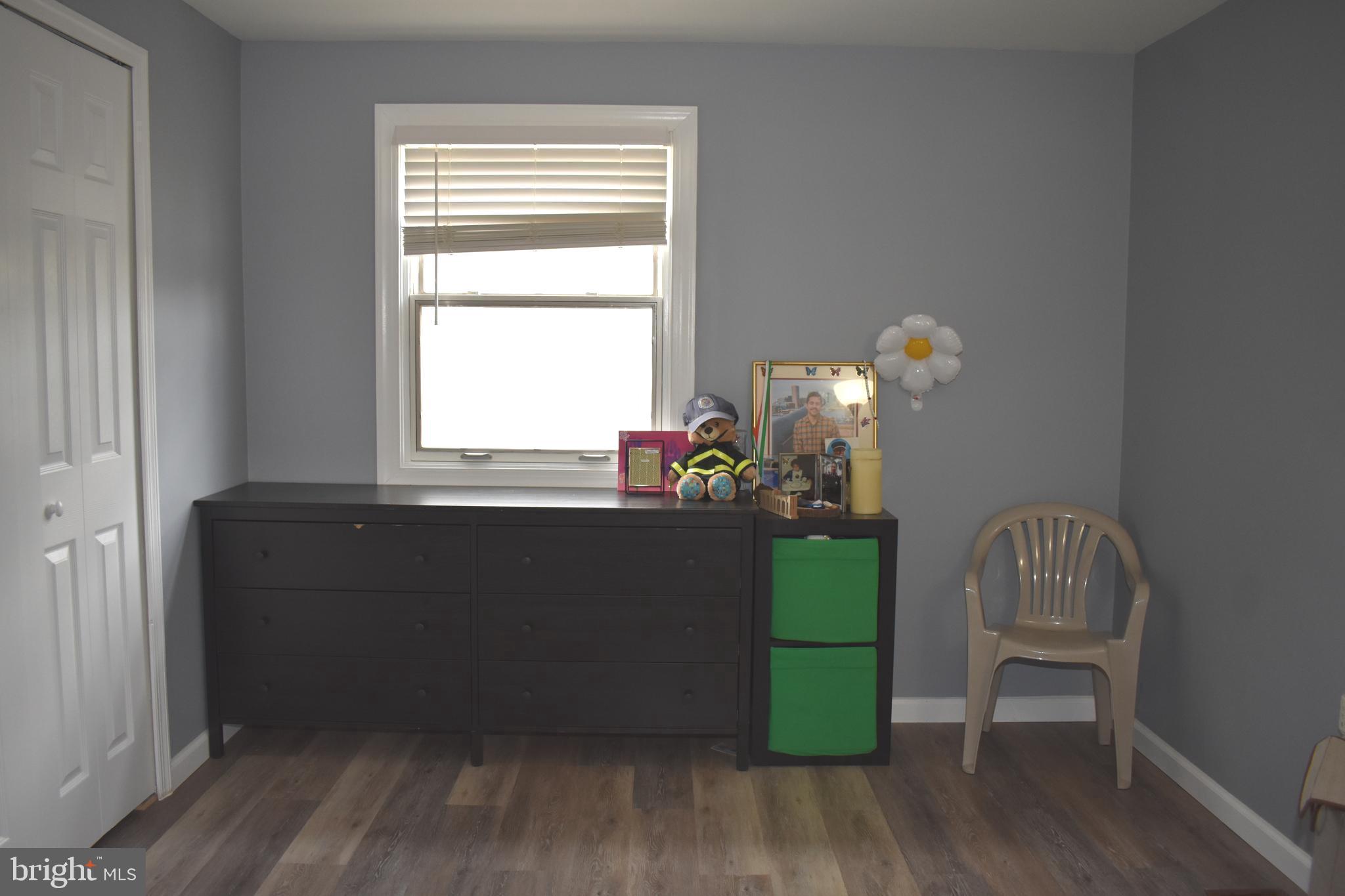 12176 Dove Circle Laurel, MD 20708 - Photo 25 of 34 a living room with furniture and a window