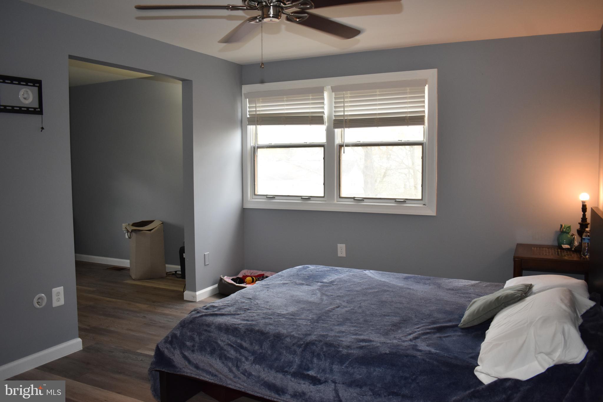 12176 Dove Circle Laurel, MD 20708 - Photo 30 of 34 a bedroom with a bed and a window