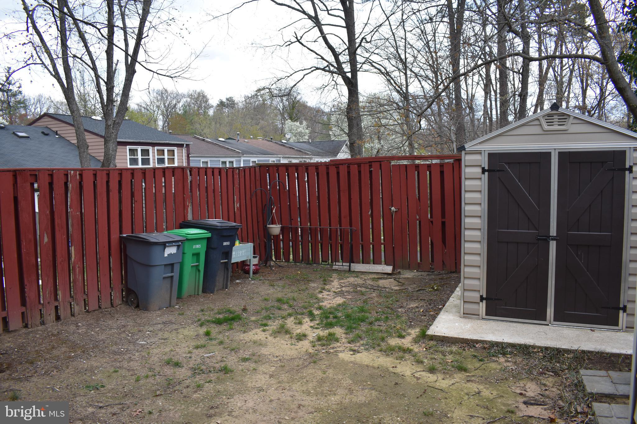 12176 Dove Circle Laurel, MD 20708 - Photo 31 of 34 a front view of a house with garden