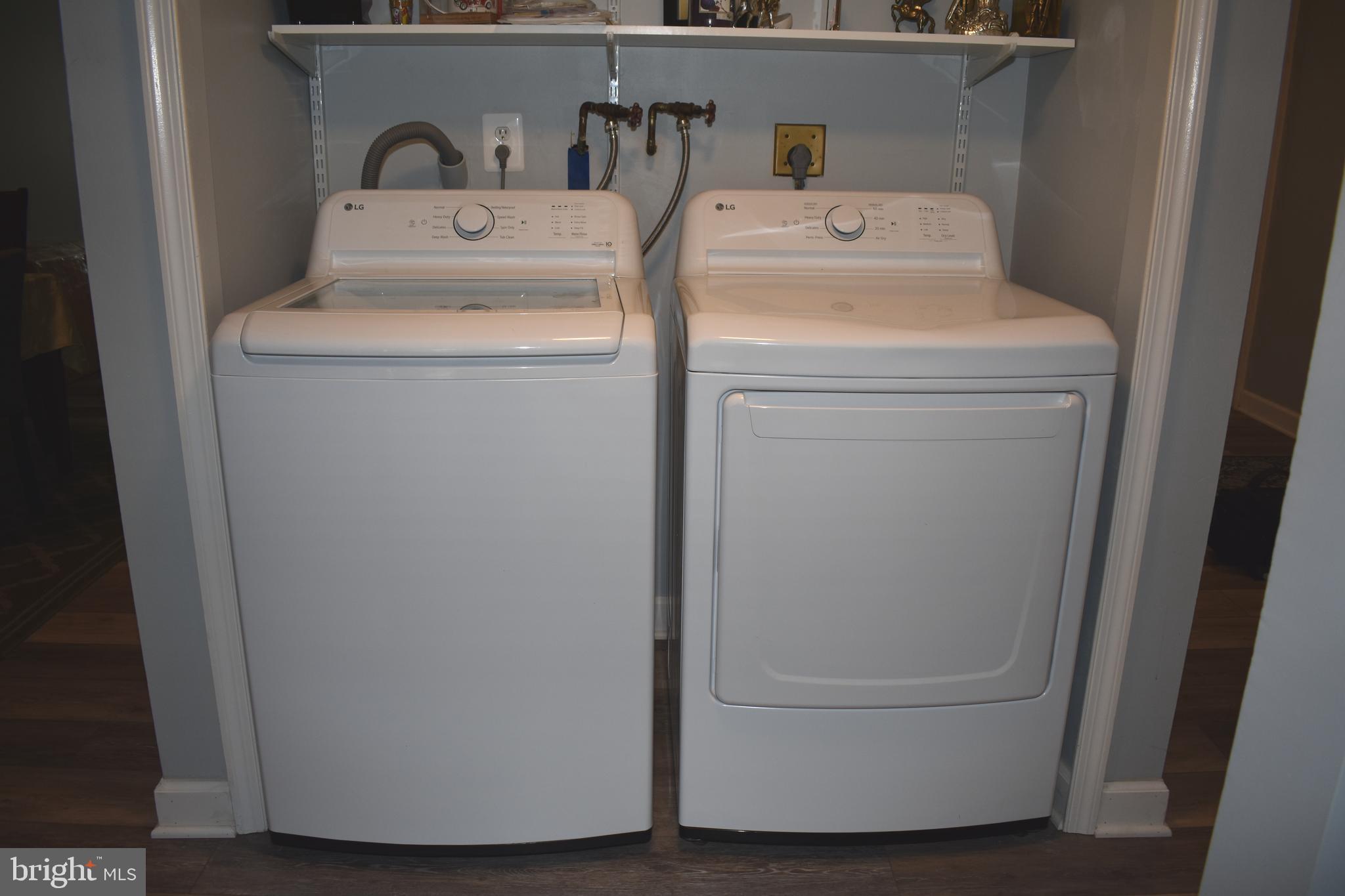 12176 Dove Circle Laurel, MD 20708 - Photo 8 of 34 a utility room with dryer and washer