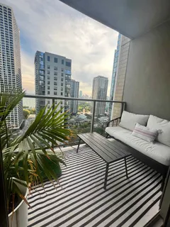 a view of a balcony with ocean view