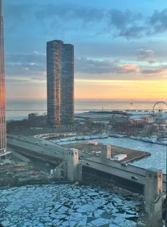 a spacious bathroom with a granite countertop double vanity sink a mirror and a toilet