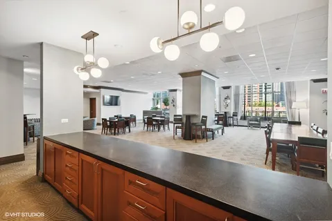 a row of potted plants in front of a building