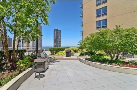 a view of city with tall buildings