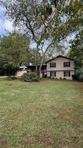 a view of a house with a big yard