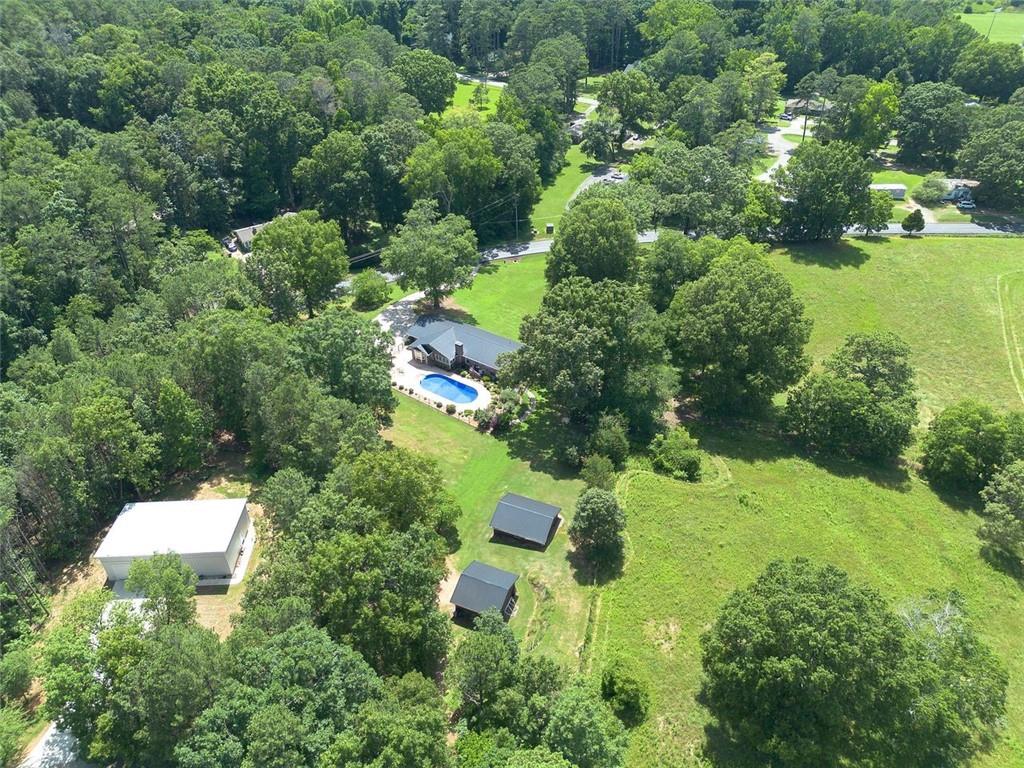 408 Mac Johnson Road Northwest Cartersville, GA 30121 - Photo 74 of 79 an aerial view of residential house with outdoor space and trees all around