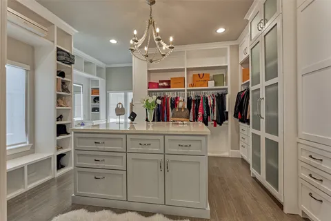 a kitchen with a refrigerator and a sink