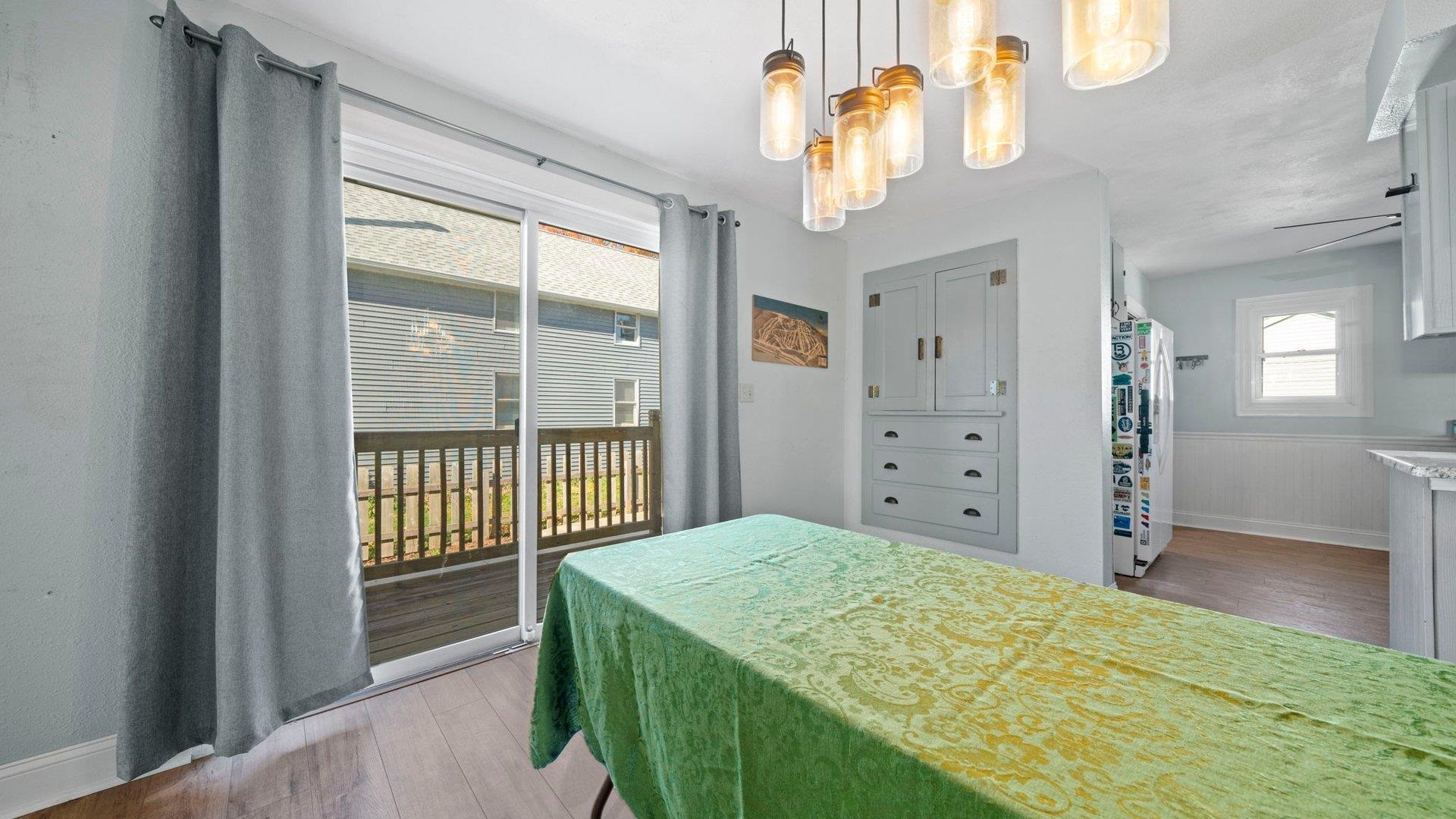 401 West 3rd Street Byron, IL 61010 - Photo 16 of 43 a bathroom with a granite countertop sink and a large mirror