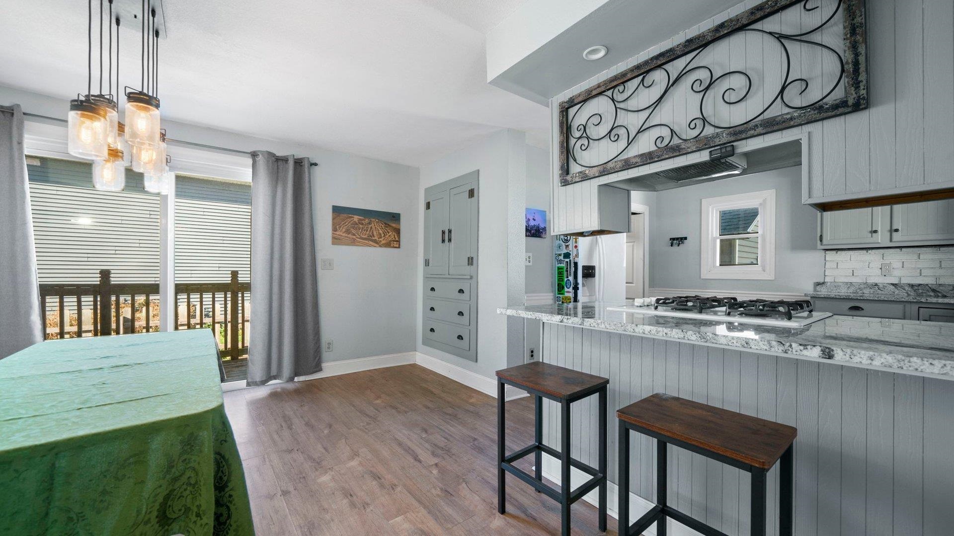 401 West 3rd Street Byron, IL 61010 - Photo 18 of 43 a kitchen with a table and chairs in it