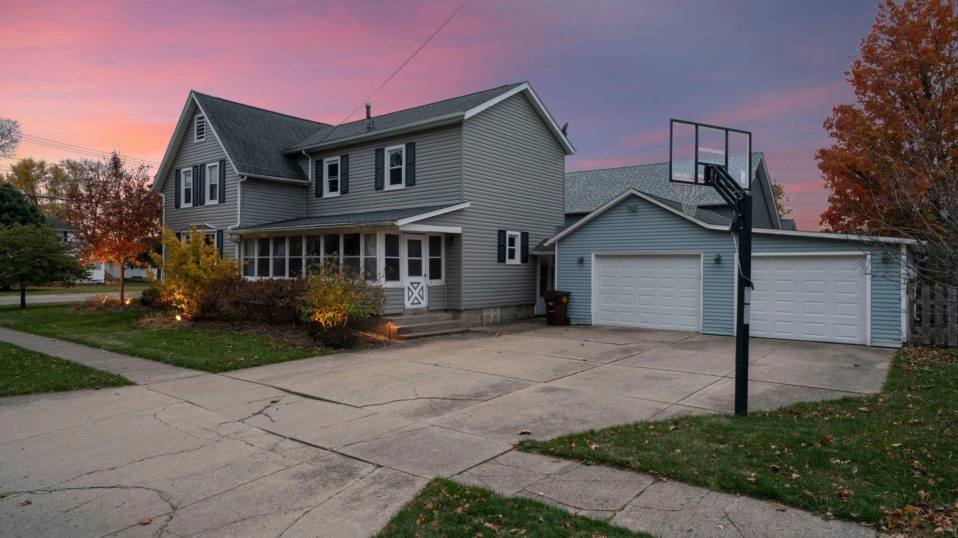 401 West 3rd Street Byron, IL 61010 - Photo 2 of 43 a view of a house with a yard