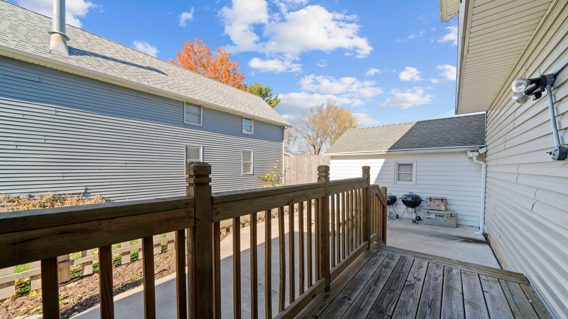 401 West 3rd Street Byron, IL 61010 - Photo 33 of 43 a view of a balcony with wooden floor