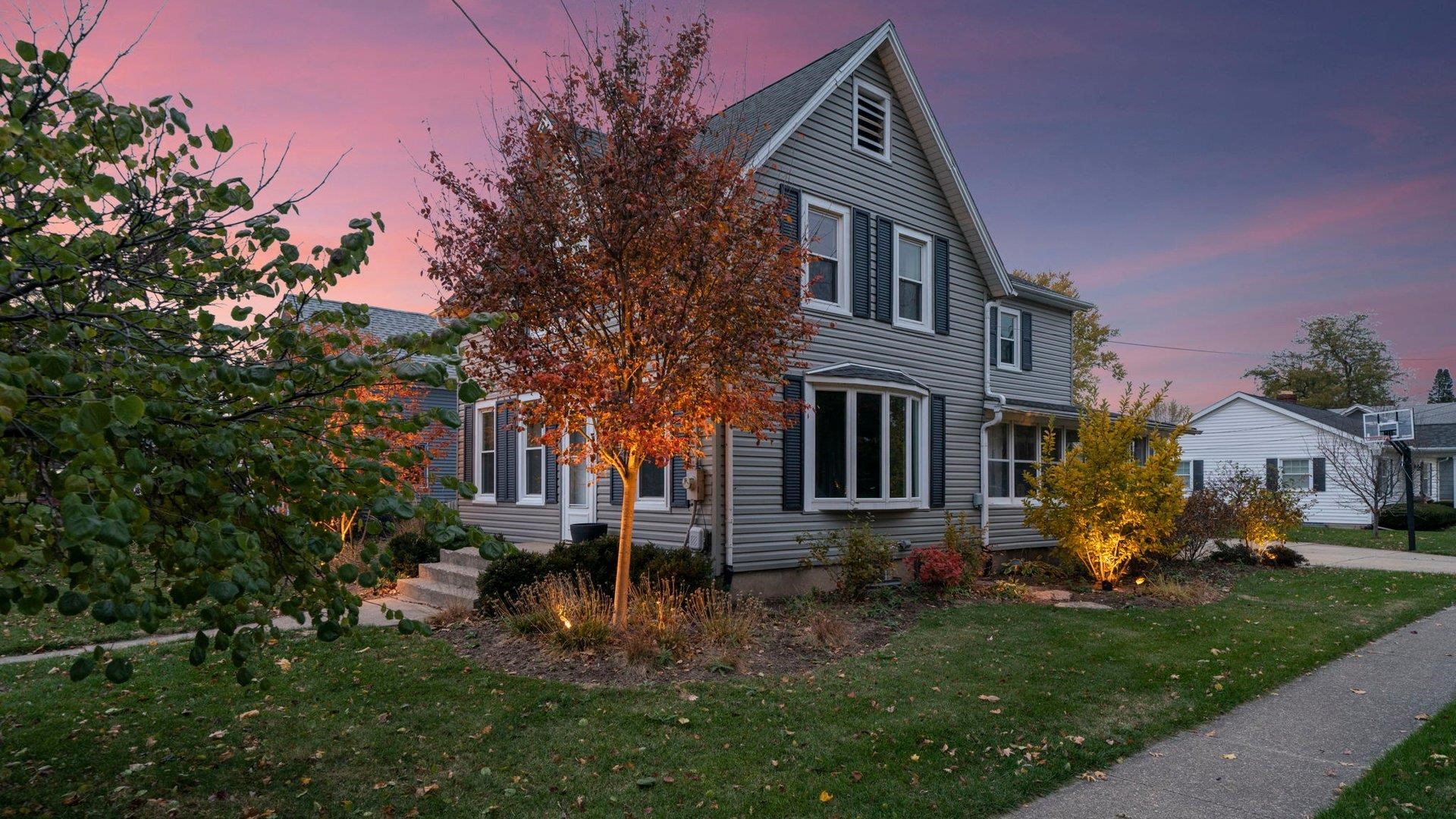 401 West 3rd Street Byron, IL 61010 - Photo 40 of 43 a front view of a house with garden