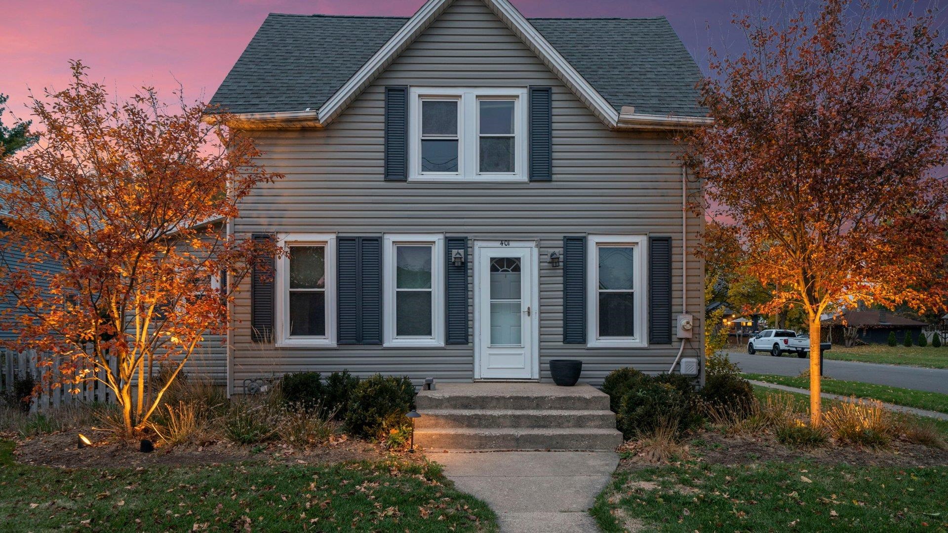 401 West 3rd Street Byron, IL 61010 - Photo 41 of 43 front view of a house with a yard