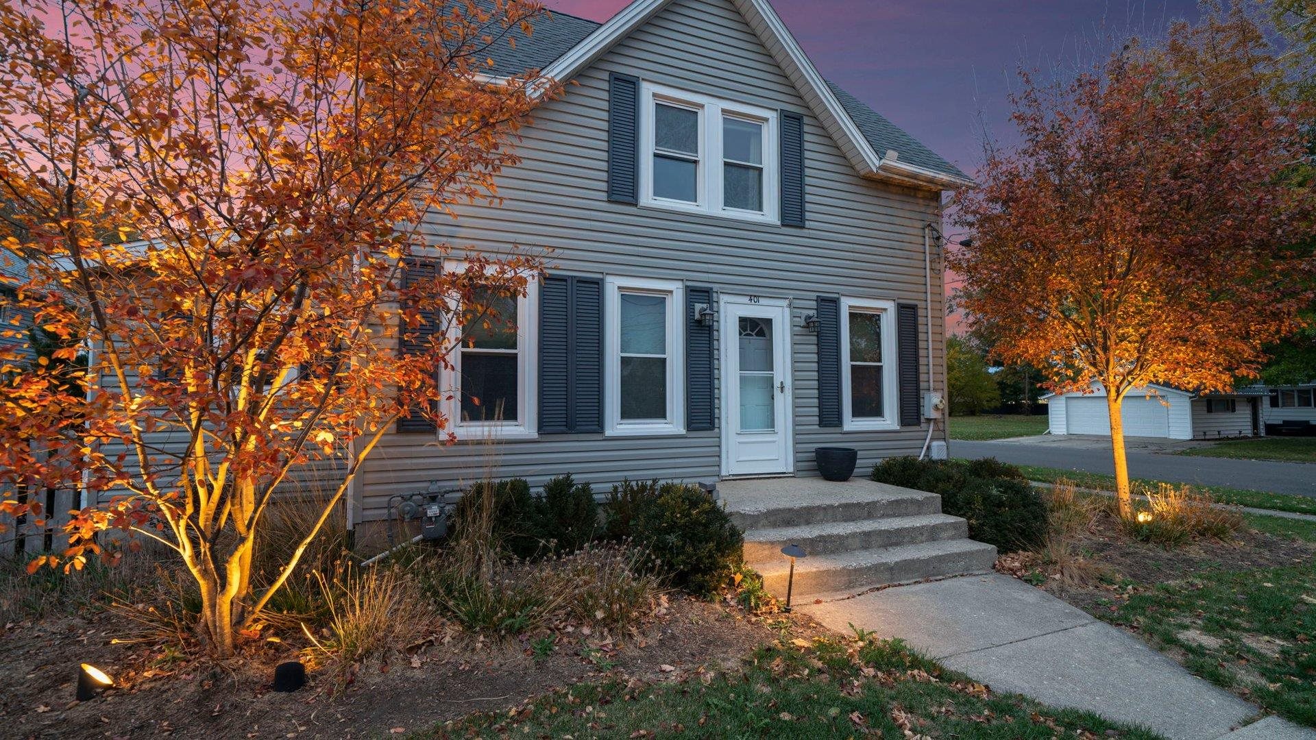 401 West 3rd Street Byron, IL 61010 - Photo 42 of 43 a front view of a house with garden
