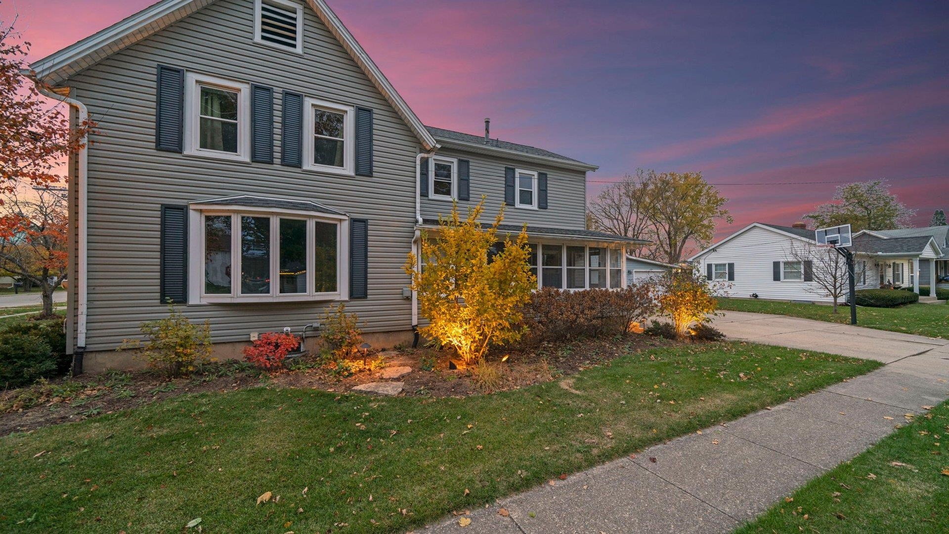 401 West 3rd Street Byron, IL 61010 - Photo 43 of 43 a front view of house with yard and green space