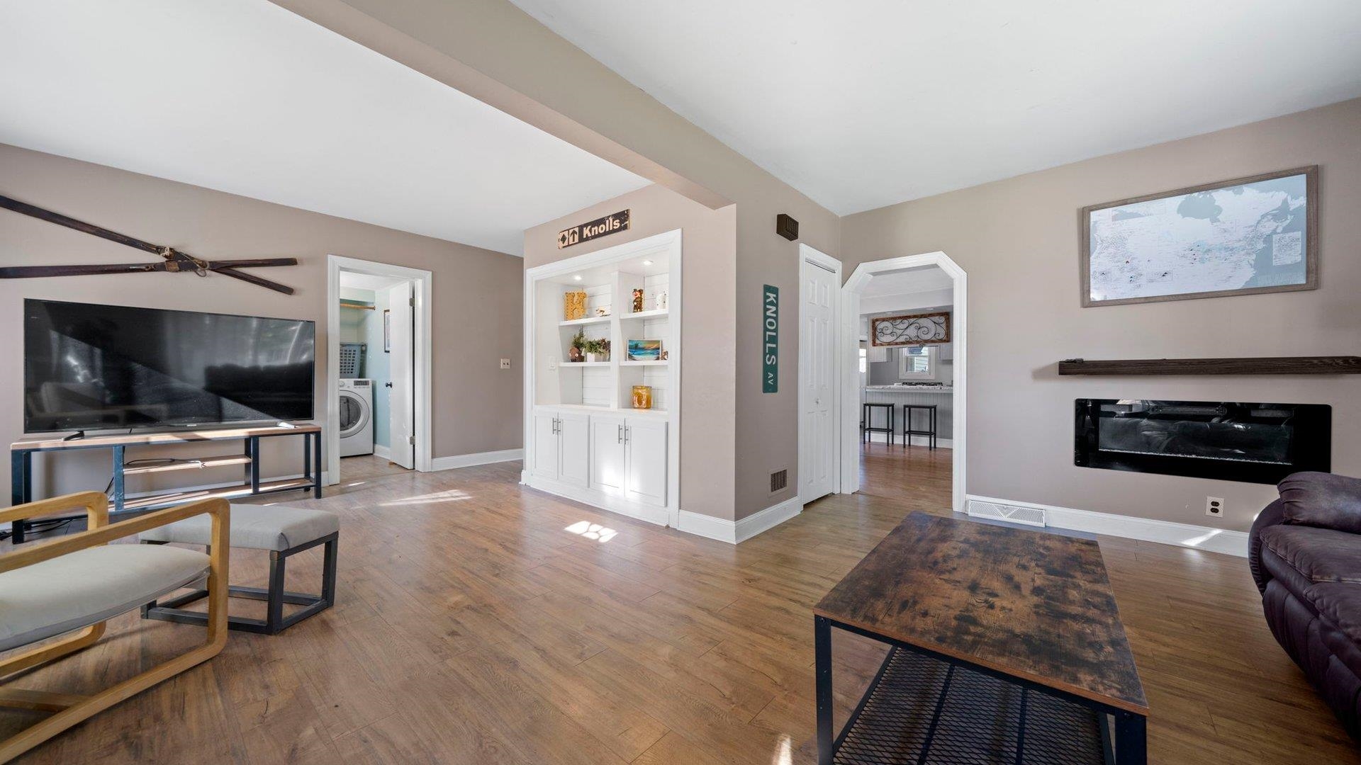 401 West 3rd Street Byron, IL 61010 - Photo 9 of 43 a view of a livingroom with furniture and a flat screen tv
