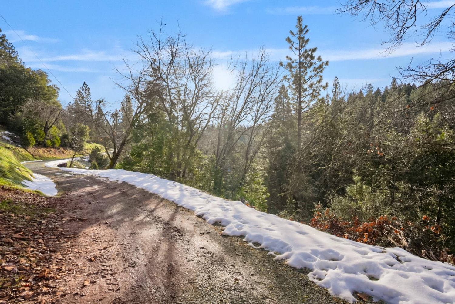 1191 Barney Way West Point, CA 95255 - Photo 6 of 19 a view of a road with a snow in the background