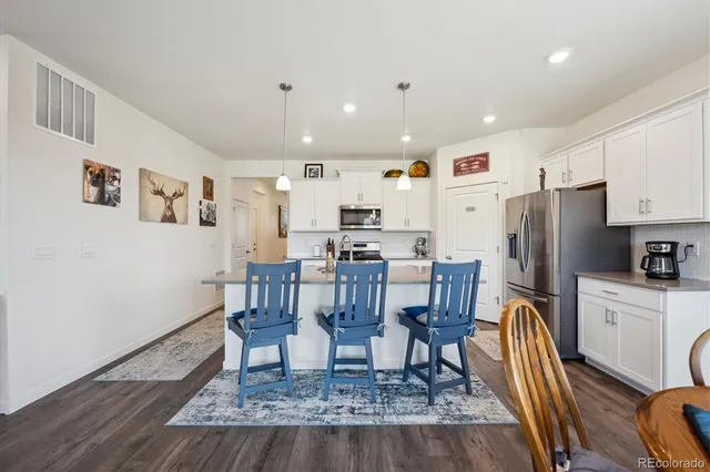 a living room with furniture and a couch