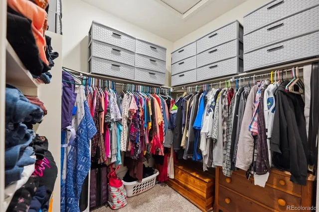 a view of a patio with a table and chairs