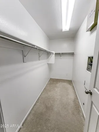 a view of a room with rack on the wall