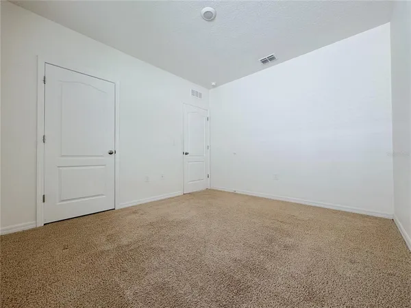 a view of small space with racks on the wall