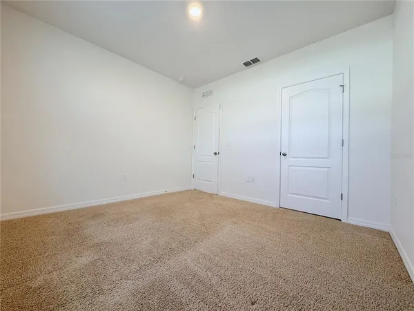 an empty room with an entryway